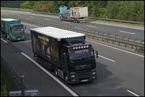 MAN TGA 18.400XLX der WESTRANS GmbH. Der Auflieger macht Werbung fr den Futtermittelhersteller Belcando. (07.05.2009)
