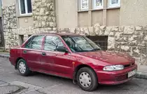 Diesen Mitsubishi Lancer Mk5 (Cambridge Red) habe ich in Januar 2021 gesehen.