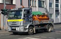 =MAN des Entsorgers FISCHER unterwegs in Würzburg im März 2022