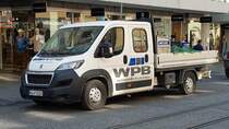 =Peugeot Boxer vom WÜRZBURGER PFLASTERBAU, gesehen im März 2022