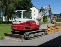 Kleinbagger TAKEUCHI TB 290-2 bei einer Baustelle in Busswil am 11.06.2022
