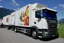 Scania Hängerzug der Migros am 26.6.22 beim Trucker Festival Interlaken.