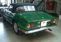 Heckansicht eines Fiat Dino Spider im Farbton verde scuro. Classic Remise Düsseldorf am 12.07.2022.