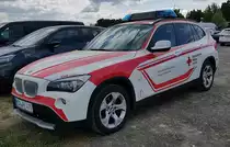 =BMW X1 des BRK OV KARLSTADT, gesehen auf dem Parkplatz der Rettmobil 2022, 05-2022