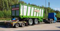 =Bergmann Carex 390 K verlastet auf einem Tieflader, 05-2022