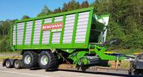 =Bergmann Carex 390 K verlastet auf einem Tieflader, 05-2022