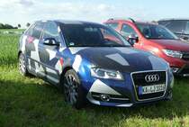 =Audi A 3 in auffälligem Design, steht auf dem Parkplatz der Rettmobil, 05-2022