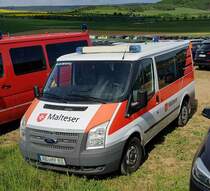 =Ford Transit der MALTESER, steht im Mai 2022 auf dem Parkplatz der RettMobil