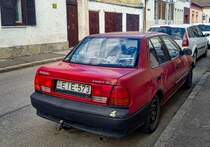 Rückansicht: Suzuki Swift Mk2 Sedan. Die Aufnahme stammt von März, 2021.