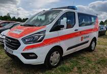 =Ford Custom Tourneo der Malteser steht im Mai 2022 auf dem Parkgelände der RettMobil