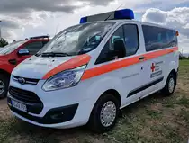 =Ford Transit vom BRK KV WÜRZBURG, gesehen auf dem Parkplatz der RettMobil im Mai 2022