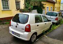 Rückansicht: Suzuki Alto der fünften Generation, gesehen in Mai, 2021.