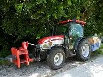 MCCORMICK CX70L, mit Frontanbau und Heckschaufel; 220606