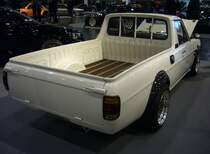 Heckansicht eines Datsun B120 1200 UTE aus dem Jahr 1976. Essen Motor Show am 06.12.2022.