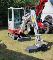 =Takeuchi TB 216 steht auf einer der Austellungsflächen beim Bürgerfest  200 Jahre Landkreis Fulda  auf dem Gelände von Schloß Fasanerie im Juni 2022