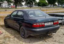 Rückansicht: Toyota Carina E. Foto: Juni, 2021.