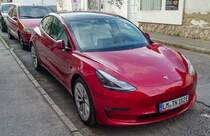 Tesla 3 in rot (07.2021).