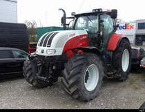 Rot - Weisser Steyr CVT 6230 in Kerzers am 14.01.2023