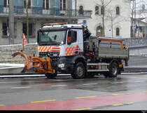 Mercedes Nr.35  ZH 59492 mit Schneepflug unterwegs in der Stadt Winterthur am 22.01.2023