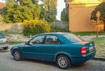 Rückansicht: Mazda 323 Mk6 in Teal Green. August, 2021.