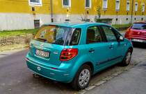 Rückansicht: Suzuki SX4  Splash Turquoise . Foto: August, 2021