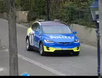 Polizei Basel - Tesla BS 94177 unterwegs in der Stadt Basel am 19.03.2023