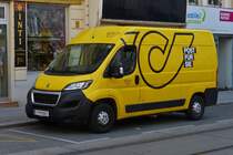 Peugeot Boxer der Österreichischen Post gesehen in Wien am Straßenrand. 06.2023