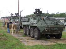 M1126 Stryker ICV (Infantry Carrier Vehicle / Infanterietransporter) der US Army, im Hintergrund ein M1127 Stryker RV (Reconnaissance Vehicle / Sphpanzer). 
Das 2nd Stryker Cavalry Regiment im bayerischen Vilseck (Truppenbungsplatz Grafenwhr) ist die einzige Brigade von Stryker-Fahrzeugen, die auerhalb der USA stationiert sind und wird im August 2007 fr einen 15-monatigen Einsatz in den Irak verlegt. Aufgenommen beim Deutsch-Amerikanischen Volksfest auf dem Truppenbungsplatz Grafenwhr am 4.8.2006.