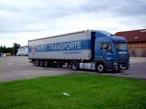 MAN_TG410A steht bei Nieselregen am Messegelnde in Ried; 090607