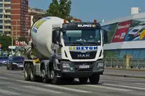 LKW MAN mit Betonmischer, aufgenommen in den Stra�en von Wien. 06.2023