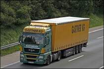 MAN TGX 18.440 der Spedition GARTNER KG aus Lambach. Im Jahr 2006 standen dem Unternehmen rund 1.400 eigene Lkw zur Verfgung standen. Auch das Unternehmen hat mit dem Rckgang zu kmpfen... 
GARTNER KG stehen ca. 850 Planensattel zu Verfung. Sonderaustattung: 280 Stck mit Jolodaausrstung fr die Papierindustrie, 150 Stck mit Papierschienen fr die Papierindustrie, 340 Stck mit Coil-Mulde fr die Stahlindustrie
55 Stck Megatrailer mit TV Zertifizierung fr die Fahrzeugindustrie...
