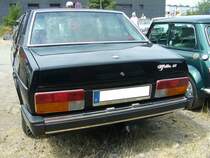 Heckansicht einer Alfa Romeo Alfetta 1.8 Limousine. Heckansicht einer Alfa Romeo Alfetta 1.8 Limousine. Oldtimertreffen an der  Alten Dreherei  in Mülheim an der Ruhr am 18.06.2023.