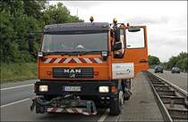 MAN LE18.220  Kehrmaschine Freudenberg  der AM Freudenberg auf der A46 bei Iserlohn. 
