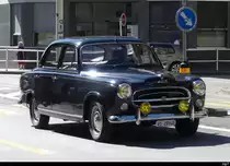 Ein Peugeot 403 in den Strassen von Morges/VD am 01.09.2023