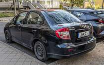 Rückansicht / Seitenansicht: Suzuki SX4 Sedan. Foto: 04.2022.