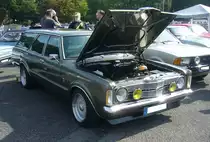 Ford Taunus TC Turnier. Dieser  Knudsen-Taunus  wurde 1972 mit dem 1.3 Liter Basismotor in Frankreich erstmalig zugelassen. Das ehemals blau lackierte Auto wurde während der Restaurierung im Original Ford-Farbton pepper grey lackiert. Motorisiert ist dieses schicke Kombimodell allerdings mittlerweile mit einem Ford-V6-Motor. 9. Ford-Classic-Event an Mo´s Bikertreff in Krefeld am 03.09.2023.