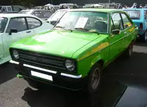 Ford Escort MK2 1300 Sport im Farbton calypsogrün. Dieses, auf sportlich getrimmte Modell, sollte insbesondere jüngere Autokäufer ansprechen. Das Modell war als zwei- oder viertürige Limousine, sowie als 1300 Sport und 1600 Sport lieferbar. Der Vierzylinderreihenmotor mit einem Hubraum von 1297 cm³ leistet 70 PS und kann den Wagen auf 155 km/h beschleunigen. 9. Ford-Classic-Event an Mo´s Bikertreff in Krefeld am 03.09.2023.