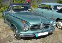 Borgward Isabella Cabriolet aus dem Jahr 1958. Insgesamt wurden ca. 30 Isabella Cabriolets im Karosseriewerk Deutsch/Köln hergestellt. Die Basis bildete bei ca. 20 Fahrzeugen die Isabella Limousine und bei den restlichen Wagen (wie bei diesem Cabriolet) das Isabella Coupe. Das Coupe und das Cabriolet war immer mit dem stärkeren Motor der Isabella TS ausgestattet. Dieser Vierzylinderreihenmotor leistet 75 PS aus einem Hubraum von 1493 cm³. 50. Jahrestreffen der Borgward I.G. e.V. an der  Alten Dreherei  in Mülheim an der Ruhr.