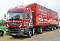 MAN TGA 18-460, Sattelzug der Firma  H�ndgen Entsorgung  am 09.05.2009 in Odendorf.