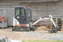 Bobcat 323 steht auf einer Baustelle in Fulda-Harmerz am 07.06.2009