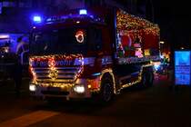 Feuerwehr Kelkheim Mercedes Benz Actros WLF am 23.12.23 bei der Christmas Fire Truck Show in Kelkheim