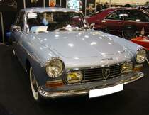 Frontansicht eines Peugeot 404 SI Coupe aus dem Jahr 1968. Essen Motorshow am 06.12.2023.