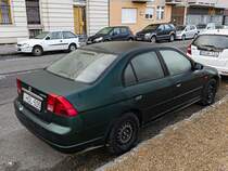 Rückansicht / Seitenansicht: Honda CIvic Mk7 Sedan. Foto: Dezember, 2022.