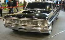 Ford Galaxie 500XL Coupe aus dem Modelljahr 1964. Der Galaxie 500XL war 1964 das sportlichste Modell der Galaxie-Familie. Der Wagen, im Farbton raven black, wurde erstmalig im Juli 1964 zugelassen. Das chice Coupe ist mit dem stärksten, damals lieferbaren, V8-Motor ausgestattet. Der  Achtender  hat einen Hubraum von 7538 cm³ und leistet 441 PS. Essen Motorshow am 06.12.2023.