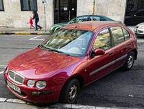 Diesen Rover 200 in rot Metallic habe ich in Dezember, 2022 fotografiert.