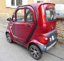 Econelo Nelo 4.2, 4-rädriger E-Kabinenroller für zwei Personen, Heckansicht, Reichweite 50Km, Dez.2023 