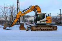 Christof Brand Liebherr 926 Compact am 20.01.24 in Hanau Hbf