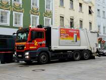 MAN mit Stummer-Müllaufbau bei der Altpapiersammlung am abfallenden Rieder Hauptplatz; 230125