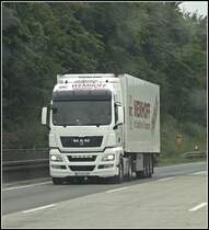 MAN TGX 18.440XLX (?) der WEMHOFF Transport GmbH mit ThermoKing Auflieger. Auffllig ist die LED-Lichtleiste an der Front.(21.06.2009)
