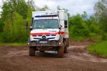 DRK Mercedes Benz Unimog U4023 I-KTW auf dem Rettmobil Parcours unterwegs am 17.05.24

